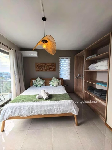 Villa moderne de 4 chambres en suite avec piscine privée- Morcellement sécurisé.