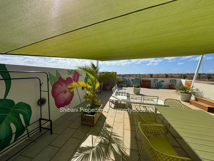 Top-Floor Apartment with Private Rooftop
