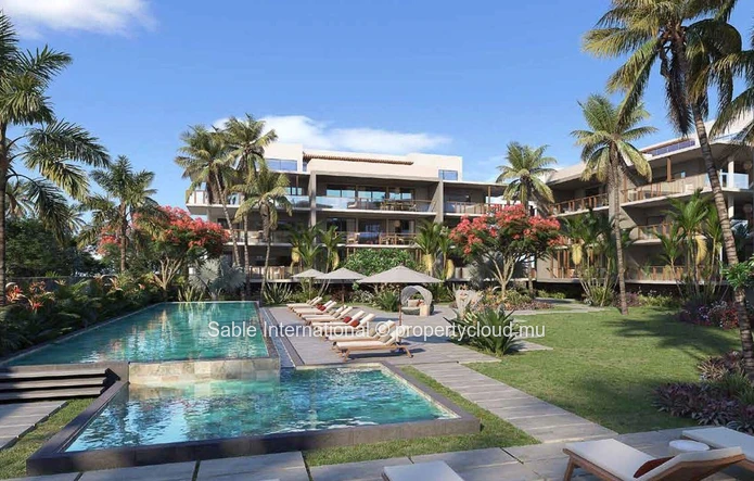 Appartement R+2 à vendre à Péreybère, 118m², 2 chambres, piscine commune, accès mer, proche commodités, cuisine équipée.