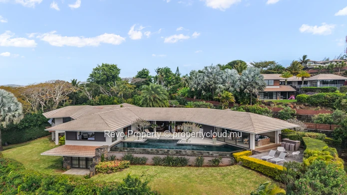 A 6-Bedroom Hillside Sanctuary with Panoramic Ocean Views.