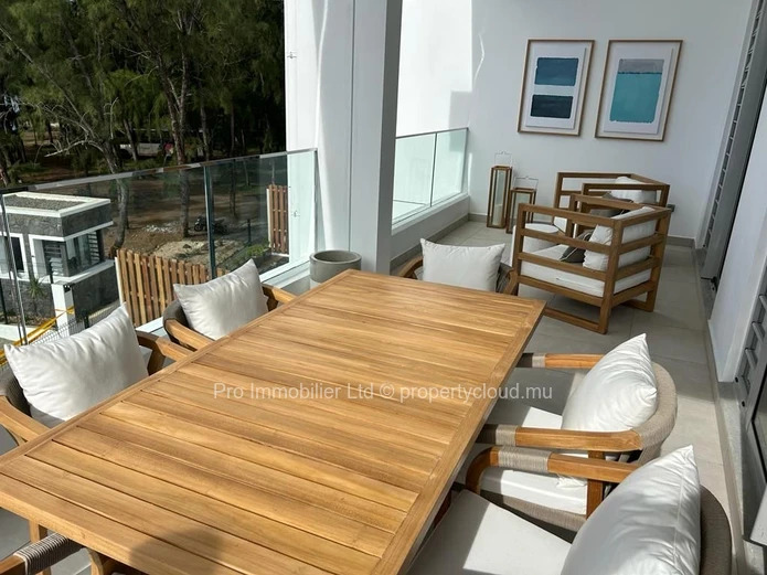 An exquisite 3-bedroom beachfront apartment available for rent on the first floor in the scenic Grand Gaube North.