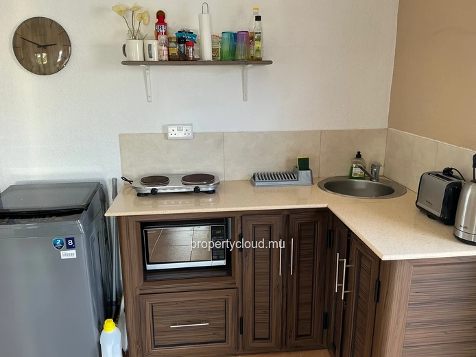 Rooftop Studio with Stunning Lagoon Views for Rent in Calodyne