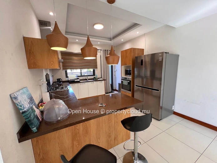 Architect-designed villa in Mon Choisy, featuring 4 bedrooms, 3 bathrooms, 1 office, and a swimming pool.