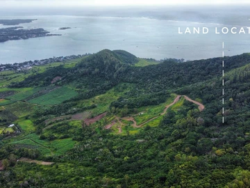 Summit Serenity: Prime Mountain Land with Panoramic Sea Views