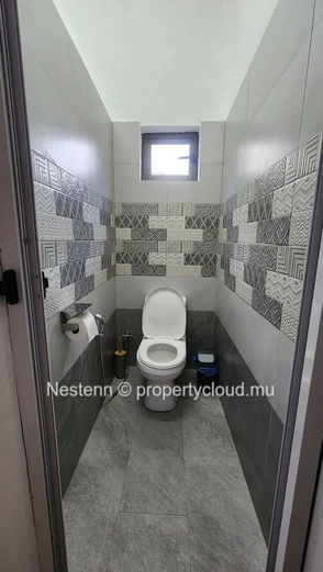 Modern furnished apartment in Beau Bassin 2 bedrooms 1 bathroom good condition ground floor close to shops and bus stop