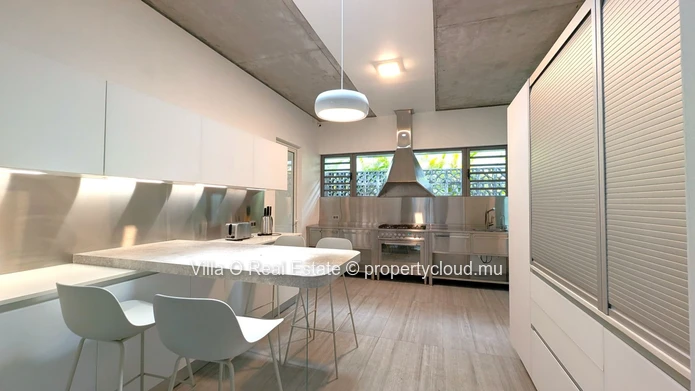 Nestled in the heart of Floreal, this architectural gem offers a modern lifestyle with an omnipresent nature that ill... (Sole Mandate)