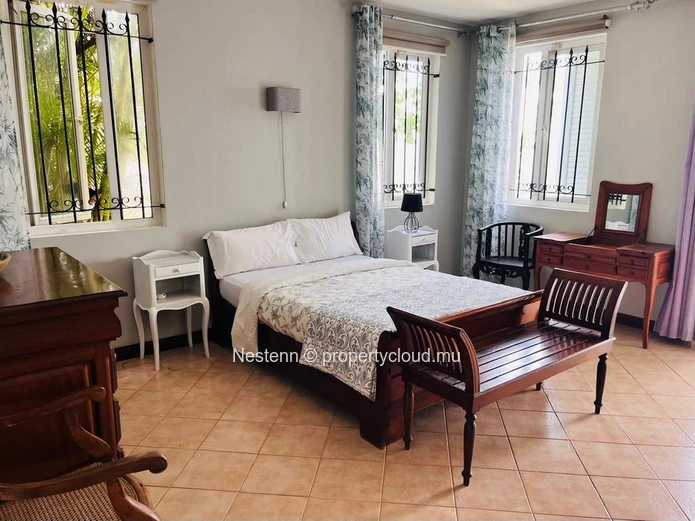 Spacious 4-bedroom duplex villa with pool