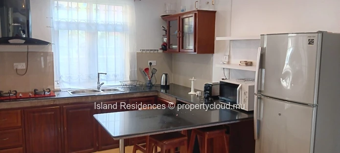 3 bedroom house with a pool and parking space in a quiet residential area in the heart of Trou aux Biches