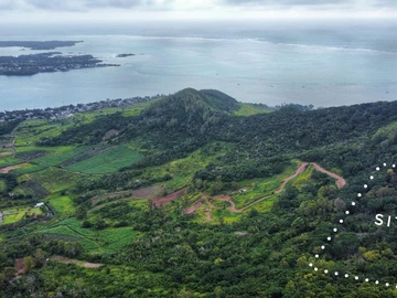 Summit Serenity: Prime Mountain Land with Panoramic Sea Views