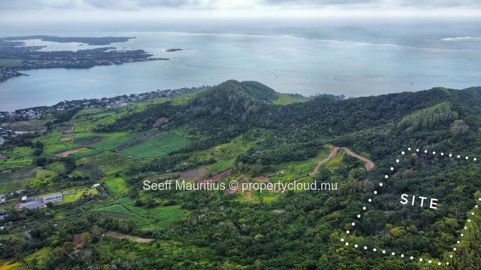 Summit Serenity: Prime Mountain Land with Panoramic Sea Views