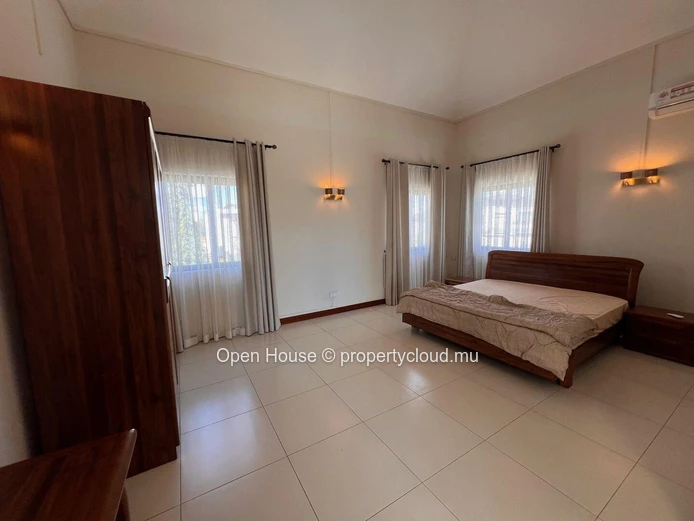 Architect-designed villa in Mon Choisy, featuring 4 bedrooms, 3 bathrooms, 1 office, and a swimming pool.
