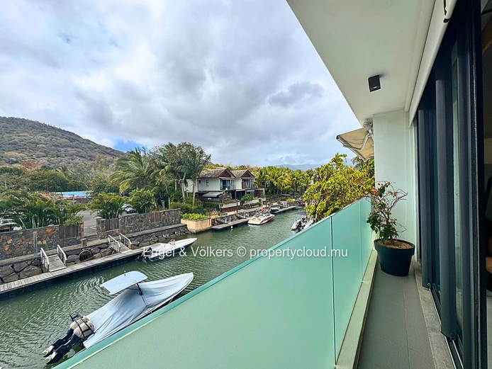 Exceptional Three-Bedroom Apartment with Panoramic Marina and Mountain Views