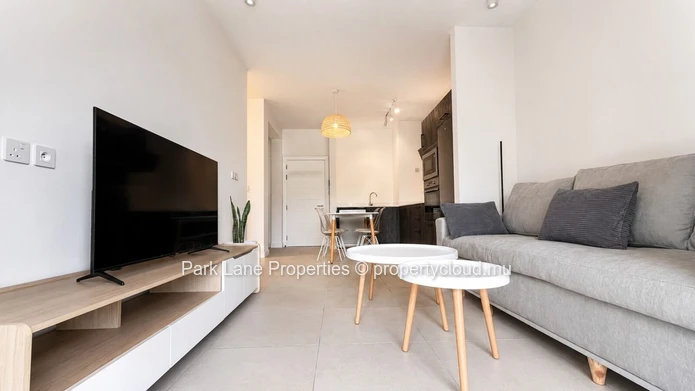 New 2-bedroom ground-floor apartment with communal pool in Beau Plan