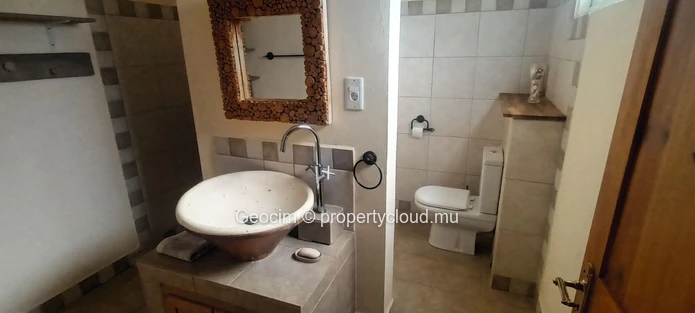 Flic en Flac Morc Anna fully furnished 2 bedrooms flat. Terrace 23 sqm. Sea View. Available now. (Sole Mandate)