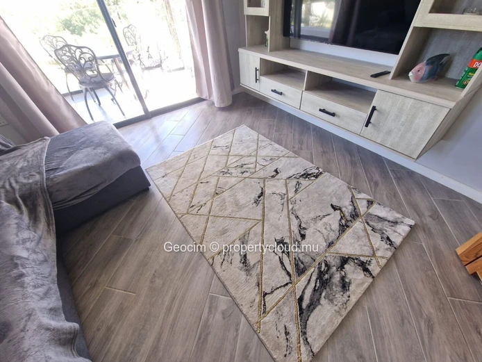 Roches Noires A 100 métres de la mer Appartement neuf de 2 càc balcon Parking Piscine communes. (Mandat exclusif)