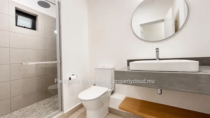 New 2-bedroom ground-floor apartment with communal pool in Beau Plan