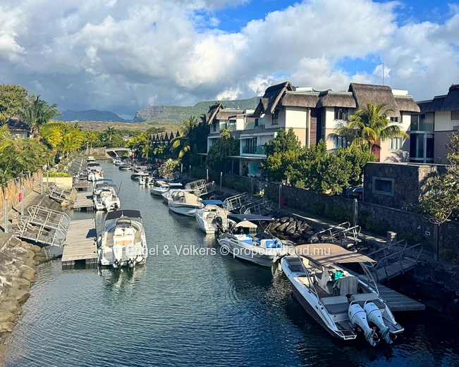 Exceptional Three-Bedroom Apartment with Panoramic Marina and Mountain Views