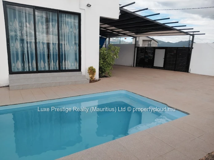 Villa Moderne et Spacieuse de 4 Chambres avec Piscine près de Port-Louis