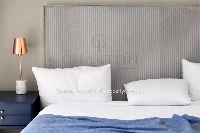 Elegant 3-bedroom apartment with en-suite bathrooms, a terrace, and exclusive amenities in Grand Gaube
