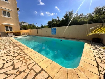 2-Bedroom Apartment for Rent in Grand Baie – Secure Residence with Pool