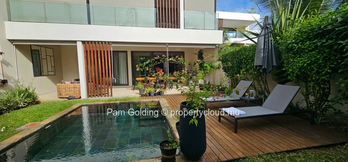 Appartement de 2 chambres en rez-de-jardin à vendre à Pointe aux Canonniers, Île Maurice | Jardin, piscine et plage à... (Mandat exclusif)
