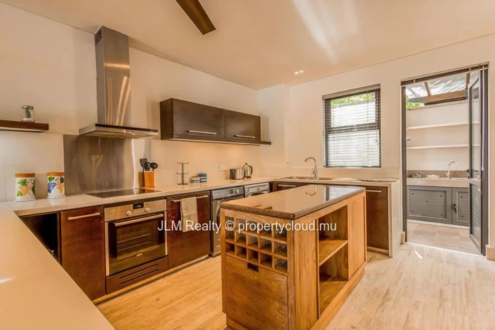 For sale, lovely waterfront duplex in the only residential marina of Mauritius, in Black River