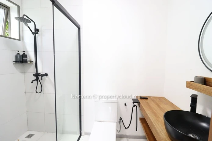 Modern Coastal Living – Elegant Fully Furnished Apartment at 3 mins from Flic en Flac Beach