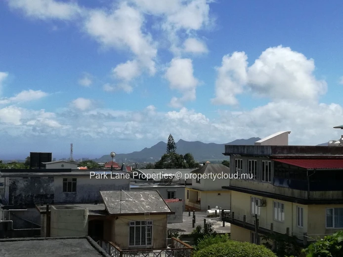 Expansive 8,847 m² Secured Plot with Building and Asphalted Area