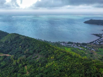 Summit Serenity: Prime Mountain Land with Panoramic Sea Views