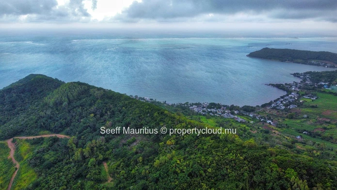 Summit Serenity: Prime Mountain Land with Panoramic Sea Views