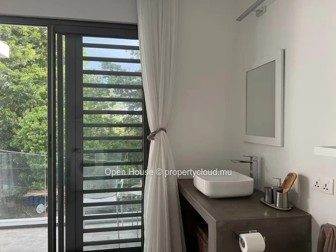 Furnished 1-Bedroom Beachfront Apartment for Rent in Roches Noires