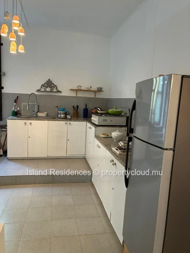 2 BR ground floor apartment with a private courtyard and parking space