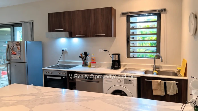 For Sale in Tamarin, Mauritius: 2-Bedroom Apartment Just Steps from the Beach with Access to a Communal Pool