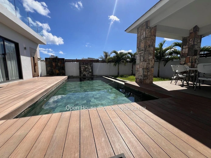 Architect-designed villa in Mon Choisy, featuring 4 bedrooms, 3 bathrooms, 1 office, and a swimming pool.