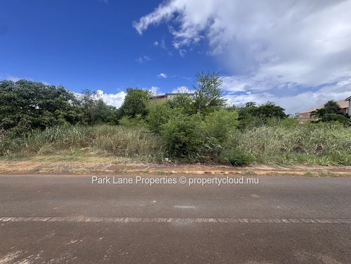 Land on corner in well established estate