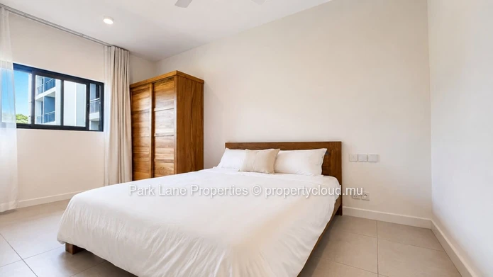 New 2-bedroom ground-floor apartment with communal pool in Beau Plan