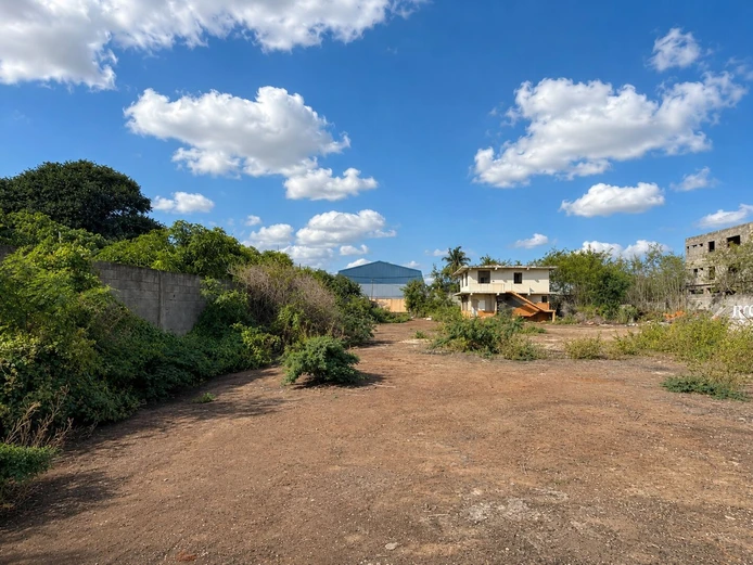 Expansive 8,847 m² Secured Plot with Building and Asphalted Area