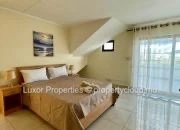 Enjoy breathtaking sea views and panoramic sights of Le Morne from this spacious and modern penthouse.