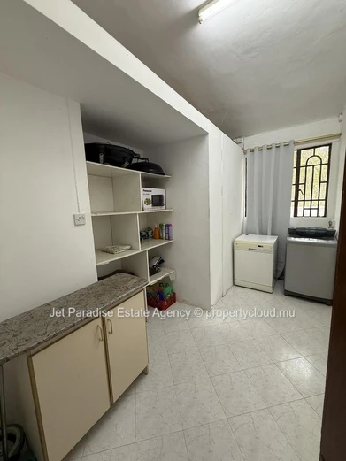 Luxurious 5-bedroom house with private pool in Flic en Flac area, sea access, fully furnished, secure. Price Rs.
