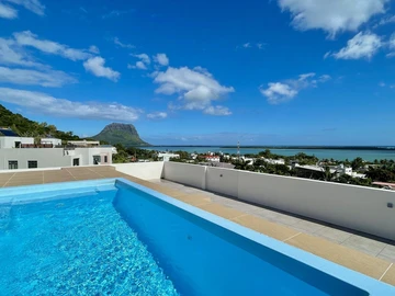 Modern 3-Bedroom Apartment with Sea Views & Rooftop Pool in La Gaulette