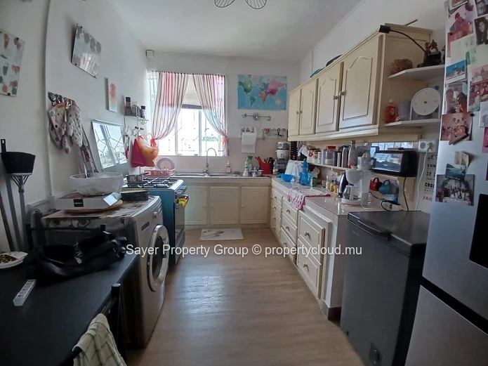 Rare Opportunity: Spacious Top Floor Apartment with Ocean Views