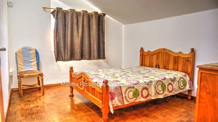 À 1 minute à pied de la plage de Flic en Flac - appartement de 2 chambres - idéal pour un investissement immobilier.