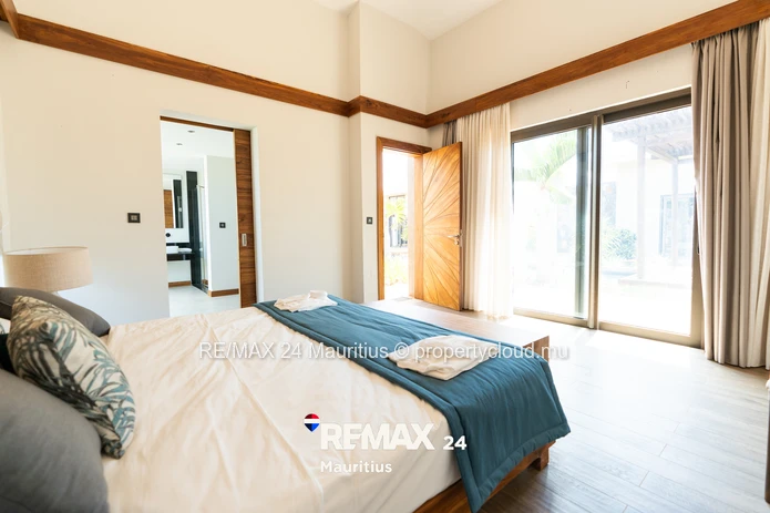 Elegant 4-bedroom Villa C with private pool, landscaped garden and spacious living areas.
