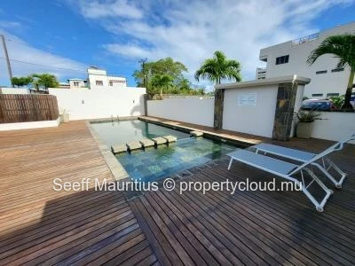 Appartement haut standing avec jardin privatif et piscine – Quartier résidentiel