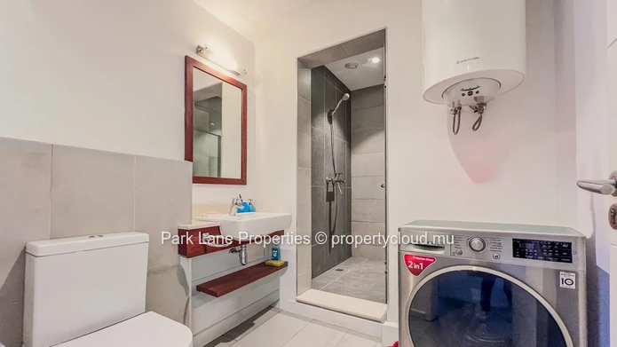 Appartement moderne de 2 chambres avec parking, idéalement situé près de CyberCity