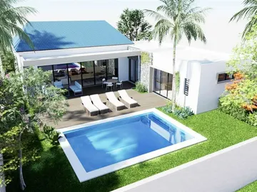 For sale, next door to Grand Baie, plot of land of 507 m2 with a 160 m2 house, pool, garden, carport.
