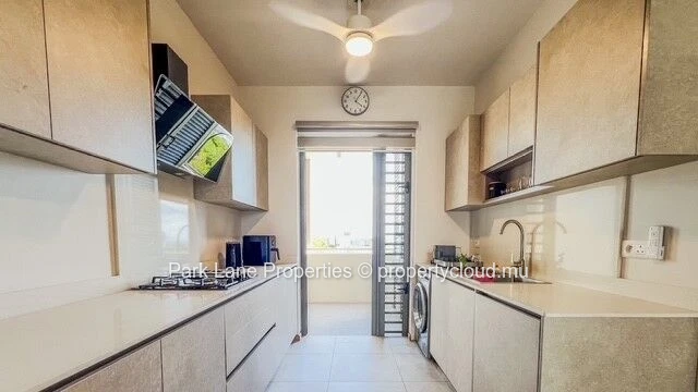 Appartement élégant dans une résidence neuve avec piscine et vue sur les montagnes à Flic en Flac