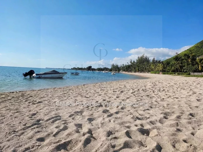 Appartement 1 chambre pieds dans l’eau avec jardin privatif face au lagon