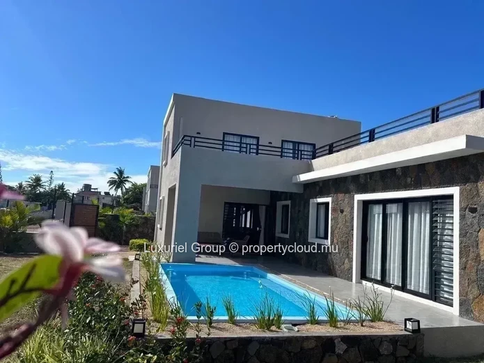 Villa contemporaine de 3 chambres à louer dans une résidence privée à Calodyne. 