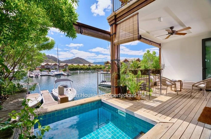 IRS VILLA for sale in Rivière Noire, Black River. 248m² living space, private pool, boat mooring.